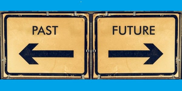 Past and Future signs with arrows pointing opposite directions