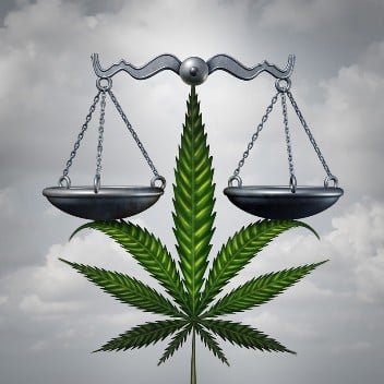 Marijuana Justice Scales Against Cloudy Sky