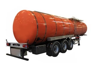 Three quarter angle shot of an orange fuel tank trailer
