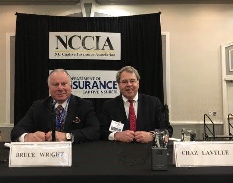Bruce Wright and Chaz Lavelle Sitting At NCCIA Booth