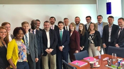 Group photo of Butler Bermuda students in an office