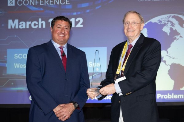 CICA President Dan Towle with 2024 Distinguished Service Award recipient, Robert H. "Skip" Myers, Jr.