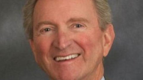 South Carolina Captives Director Jay Branum Smiling with Blue Shirt Collar
