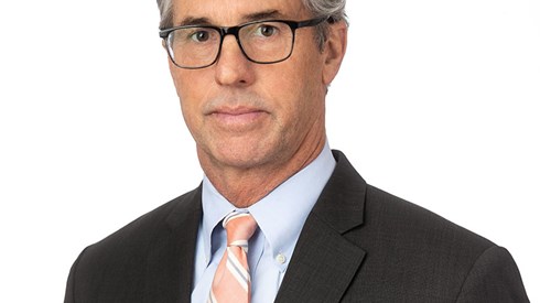 Headshot of John Hendrickson