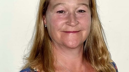 Headshot of Kathryn Anderson in front of a white backdrop