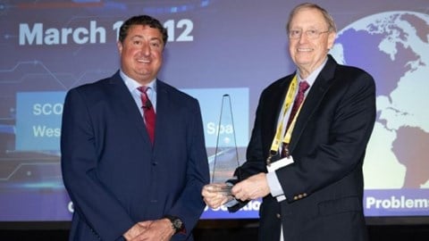 CICA President Dan Towle with 2024 Distinguished Service Award recipient, Robert H. "Skip" Myers, Jr.