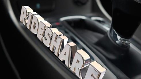Letters forming the word RIDESHARE are placed on the driver´s side of the gear shift case