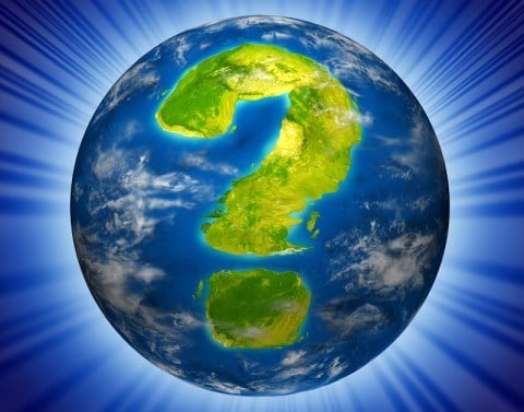 Earth planet with land in the shape of a question mark as a symbol and icon of global security and uncertainty with a glowing background