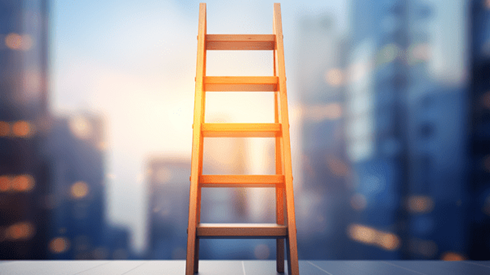 A ladder leading up against a background of skyscrapers
