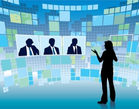 Silhouette of woman standing and talking to three silhouettes of people with virtual background