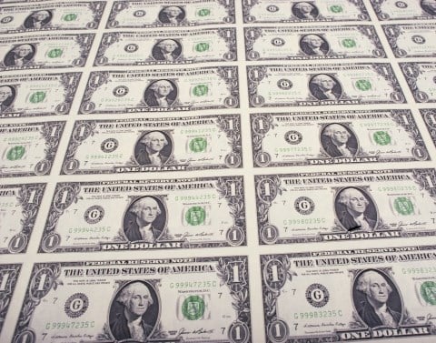 An uncut printed sheet of one dollar bills