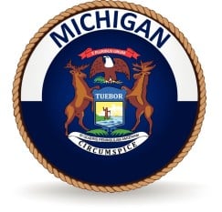 A rope circles the word MICHIGAN and the state seal which has a bald eagle, an elk and moose holding a shield