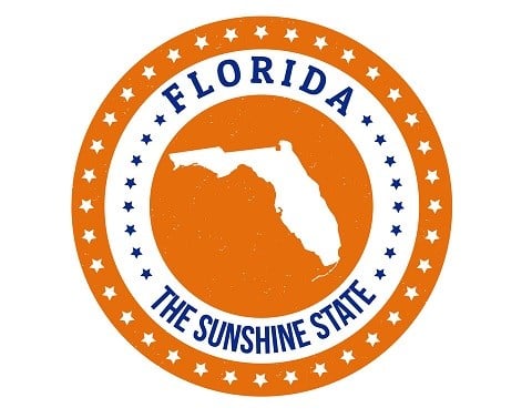 Orange Florida State Seal with white and blue text