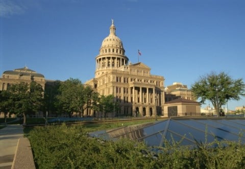 A view of the courtyard and the Texas Capitol Building in Austin
