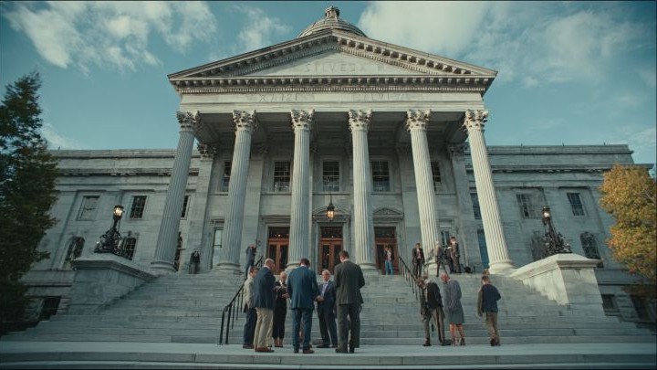 businesspeople gathering in front of the Vermont Capitol Building