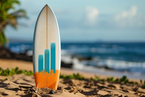 A surfboard sticking vertically out of the sand with a bar graph printed on it