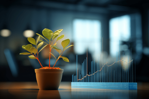 A Potted Green Plant Rests Atop an Office Desk with Upward Trending Line Graph Superimposed on Muted Background of Furniture and Windows