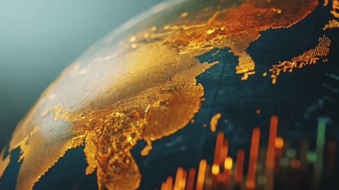 A closeup of Asia-Pacific on a digital globe with an upward trending bar graph in the lower right corner