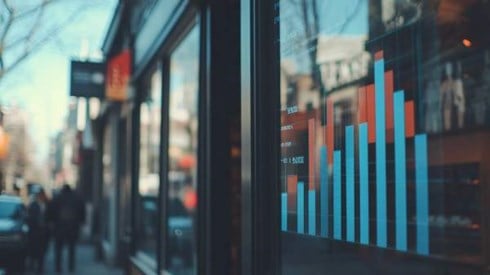 blue bar chart on the window of a retail storefront