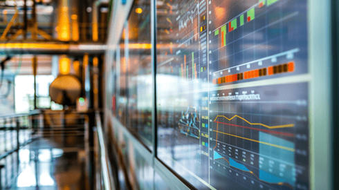 Various graphs on the wall of a factory