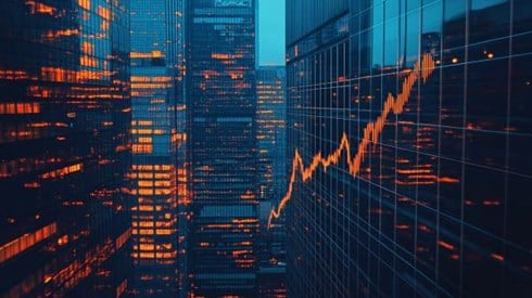 orange rising line graph superimposed over blue skyscrapers