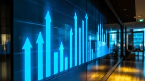 bar chart with arrows for bars projected on an office wall