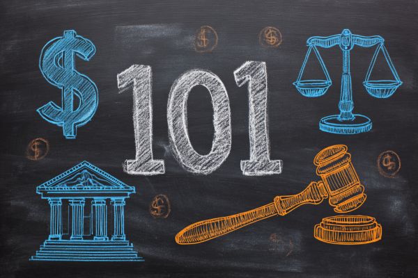 black chalkboard with "101" in white surrounded by a blue dollar sign, legal scales, and government building icons and an orange legal gavel icon
