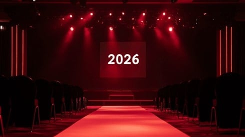 The number 2026 on the screen of a conference room's main stage