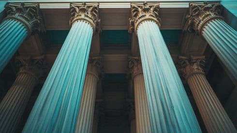 four pillars on the front of a building