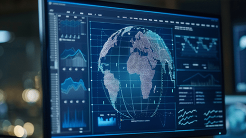 Computer monitor with an image of a digital globe surrounded by graphs