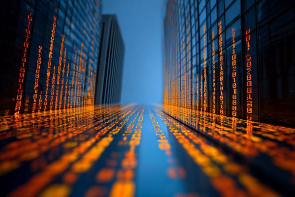 corporate buildings made from orange and blue binary code