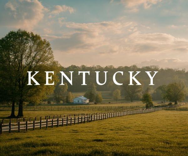 the word "KENTUCKY" superimposed over a landscape view of a horse farm with fences and green grass