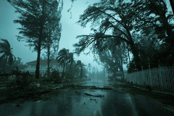 A Jamaican street with damage from a hurricane