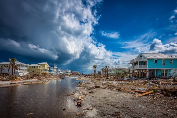 destroyed beach neighborhood after a hurricane
