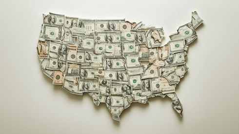 A map of the United States made out of dollar bills