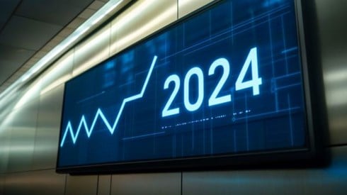 large screen with a blue line graph trending up with numbers 2024