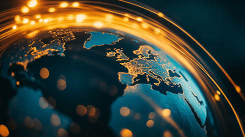 a close-up of europe on a globe with light streaks circling the globe