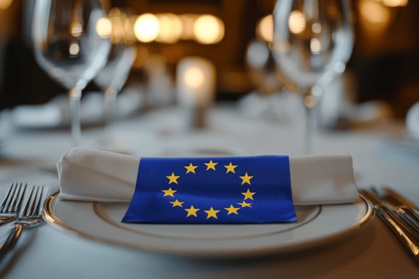 The European Union flag on a dinner plate at a fancy restaurant
