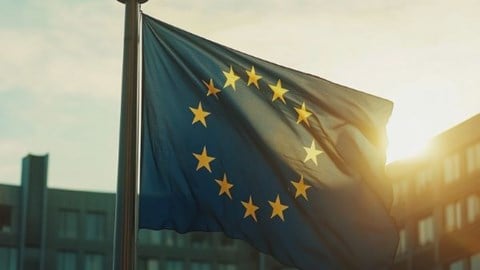 European Union flag in front of the Berlaymont Building in Brussels