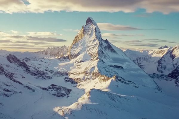 view of the snowy Matterhorn mountain on a sunny day