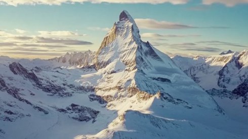 view of the snowy Matterhorn mountain on a sunny day