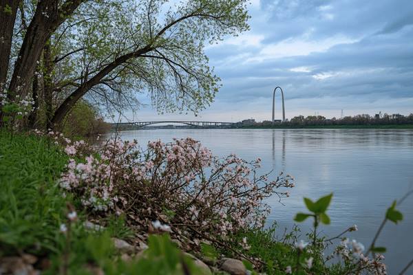 View of the St. Louis Gateway Arch from across the Mississippi River on  a Spring day