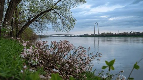 View of the St. Louis Gateway Arch from across the Mississippi River on  a Spring day