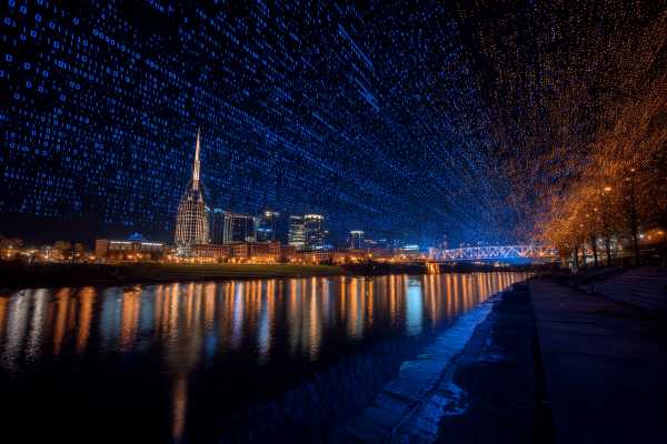 Nashville skyline in blue and orange binary code