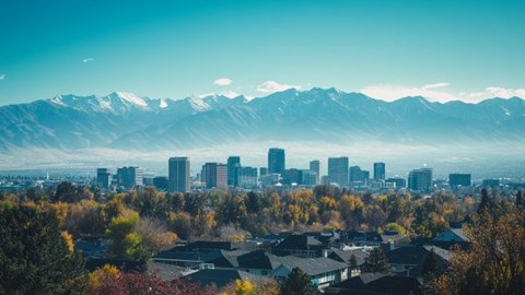 skyline view of Salt Lake City, Utah with mountains in the background