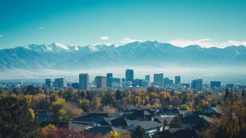 skyline view of Salt Lake City, Utah with mountains in the background