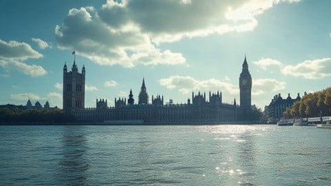 A view of the UK Parliament building from across the Thames River on a sunny day