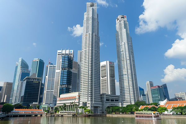 A view of skyscrappers by the water.