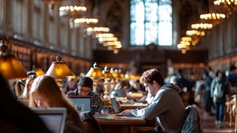 students studying in a gothic collegiate library