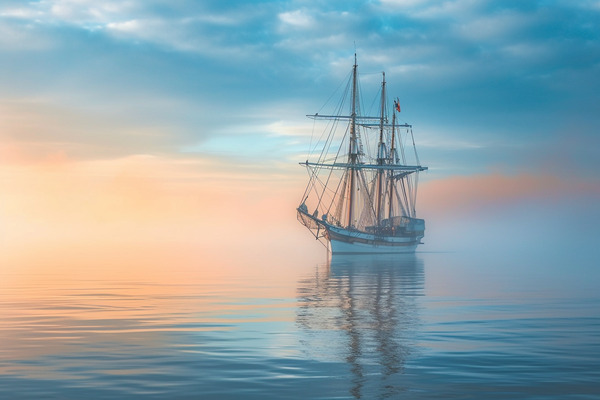 An old-fashioned ship sailing on calm seas
